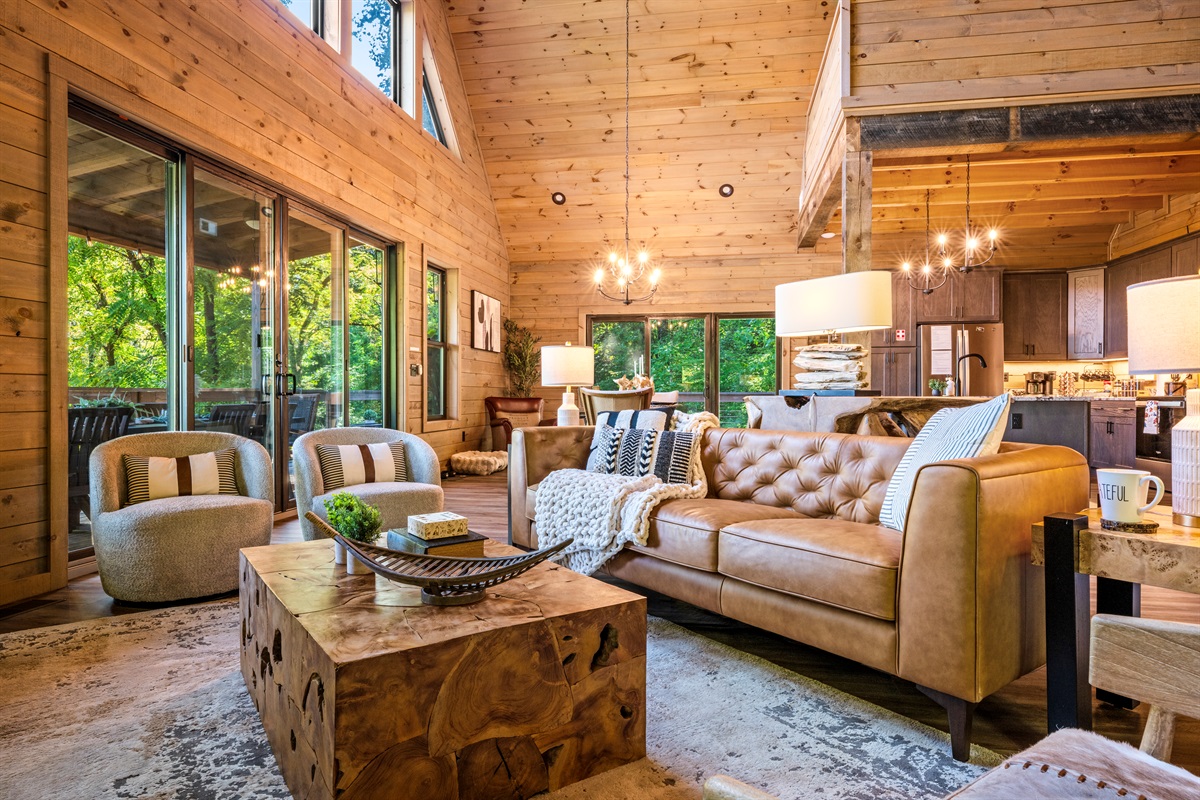🍷 Golden hour hits different here. Grab a glass of wine and sink into buttery leather while the forest glows outside.
