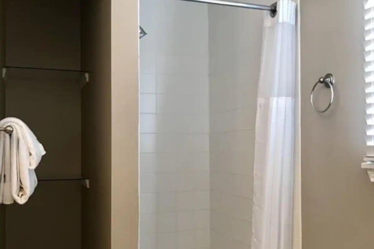 Master bathroom with shower stall