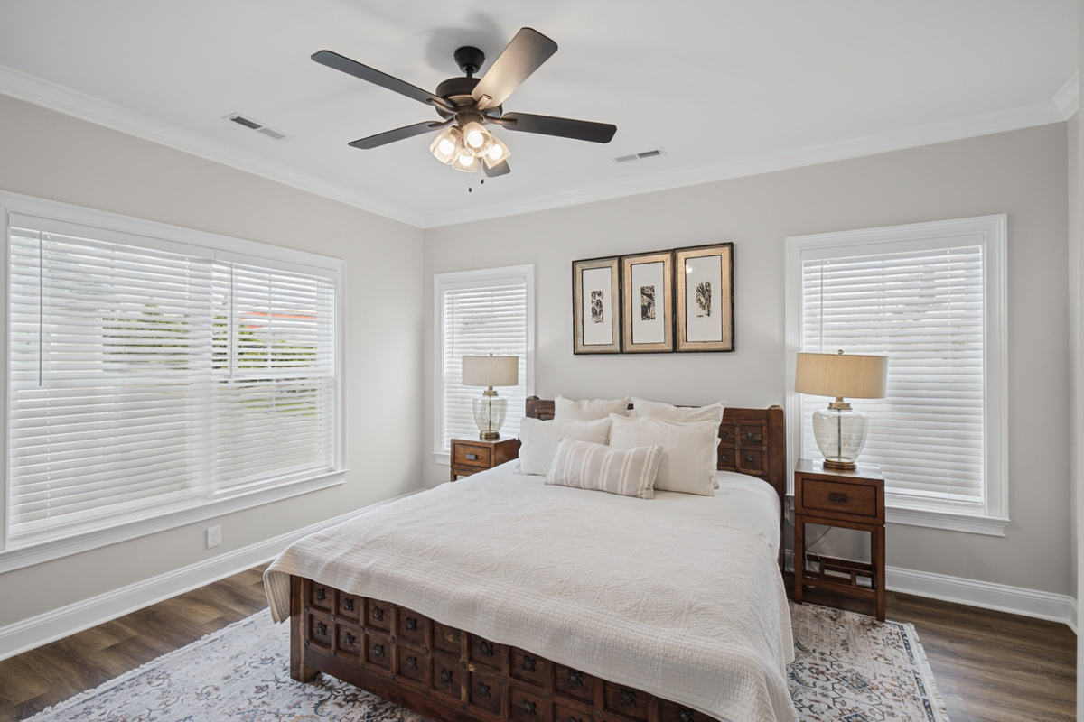 Primary suite with a king bed, Smart TV, and private ensuite bath