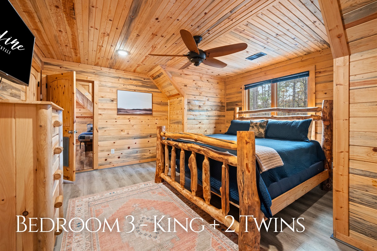 Designed with flexibility in mind, this bedroom comfortably accommodates both adults and younger guests.