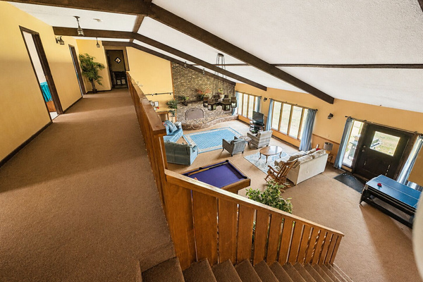 The open Great Room serves as the heart of the home, with three bedrooms conveniently located just down the hall upstairs.