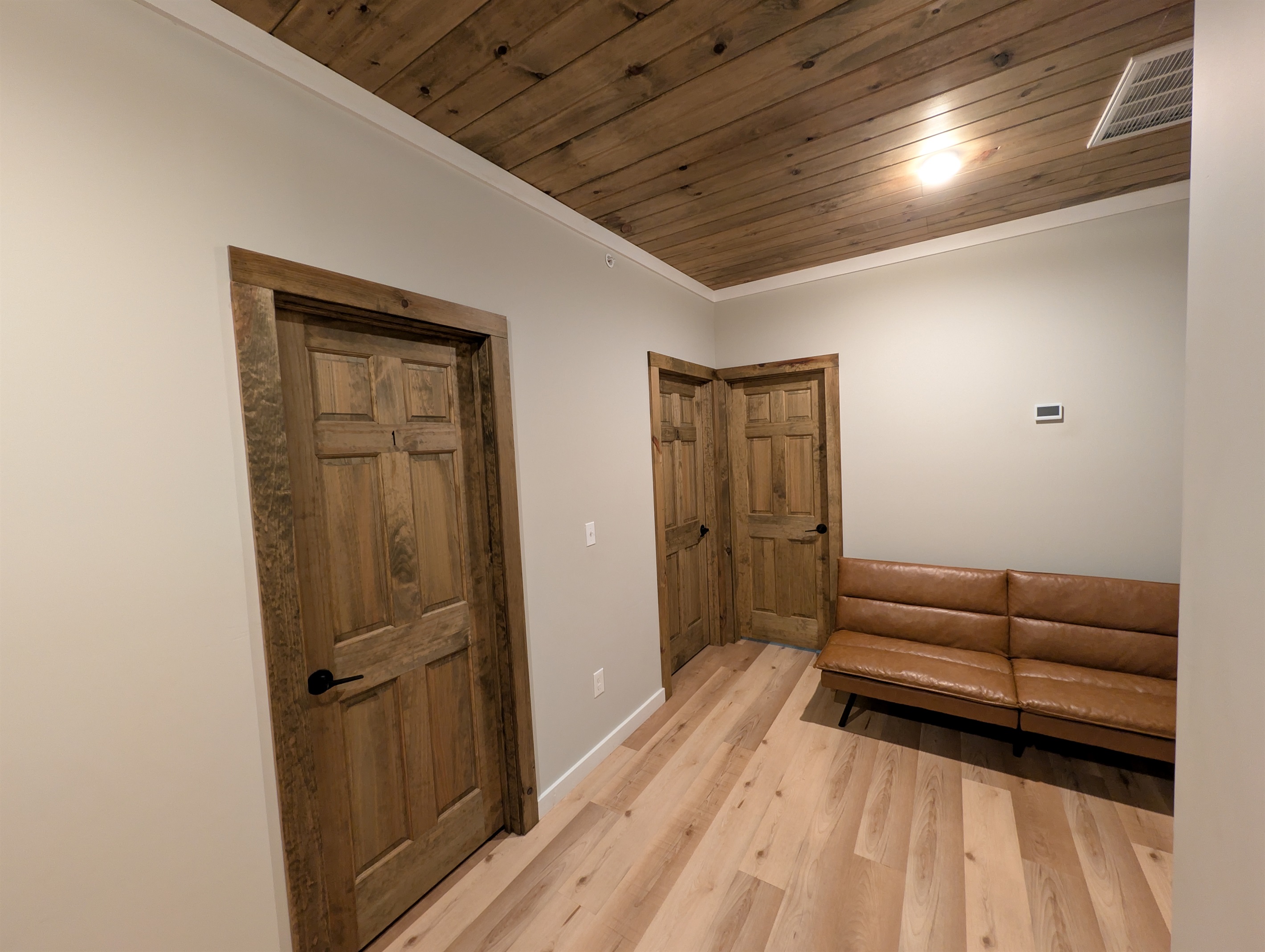 The comfortable furniture also doubles as a queen sleeping area for additional guests.