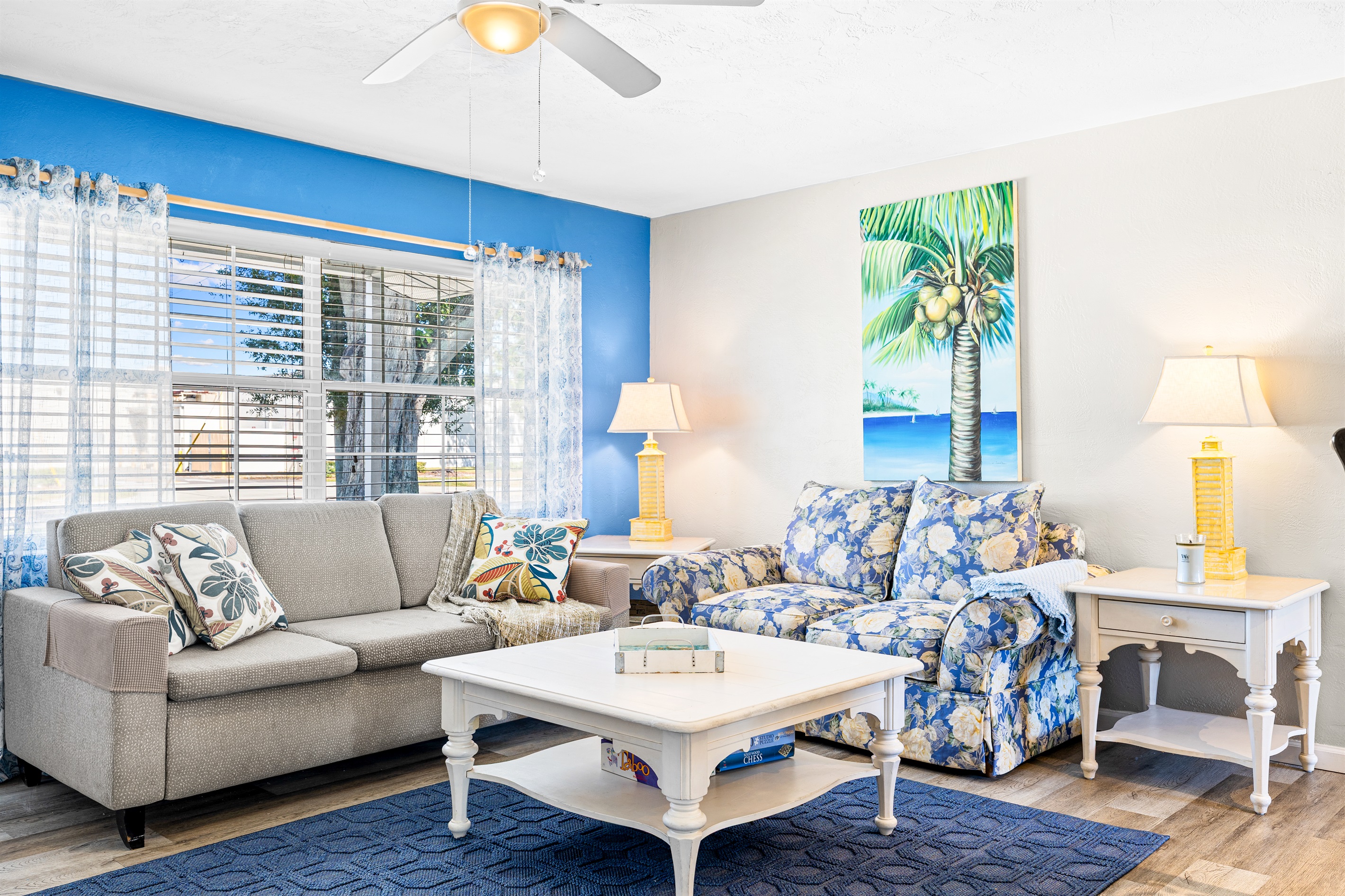 Living room with Roku TV, Games, DVD player w/DVDs, Books and a Guest table with Local Info!   Queen size MEMORY FOAM sofa bed!