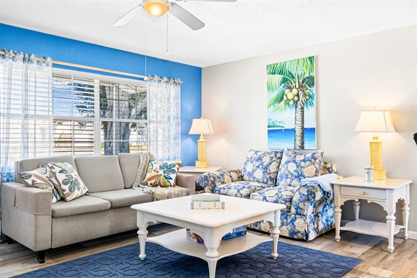 Living room with Roku TV, Games, DVD player w/DVDs, Books and a Guest table with Local Info!   Queen size MEMORY FOAM sofa bed!