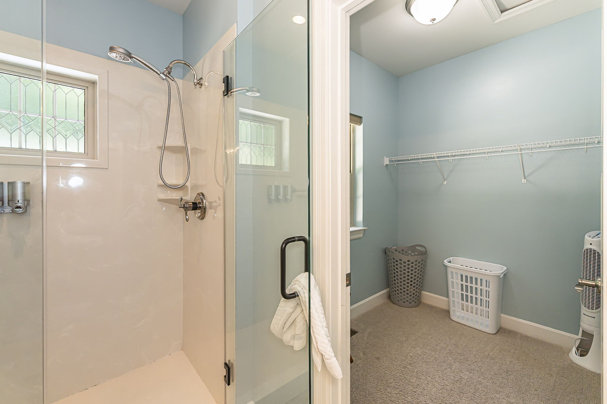 Bathroom 2 has an attached walk-in closet