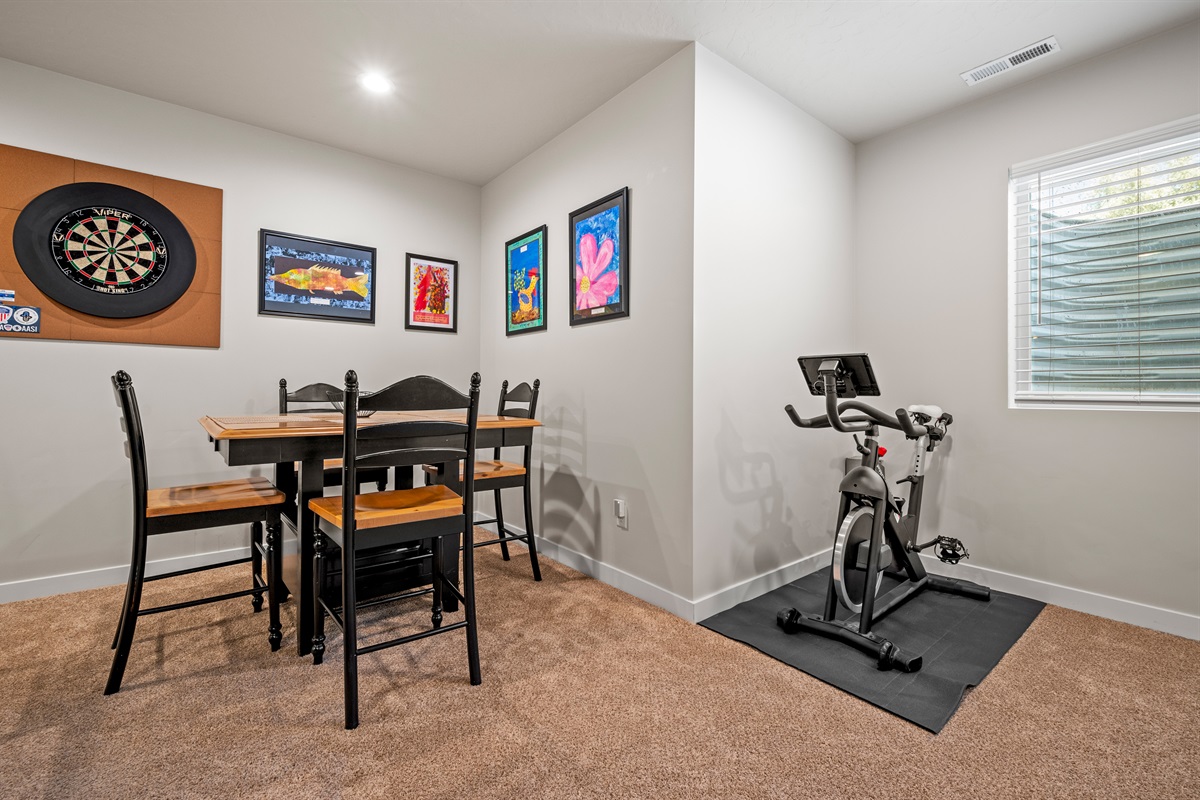 Enjoy casual meals at the dining table for four, and stay energized with an exercise bike thoughtfully placed near the window.