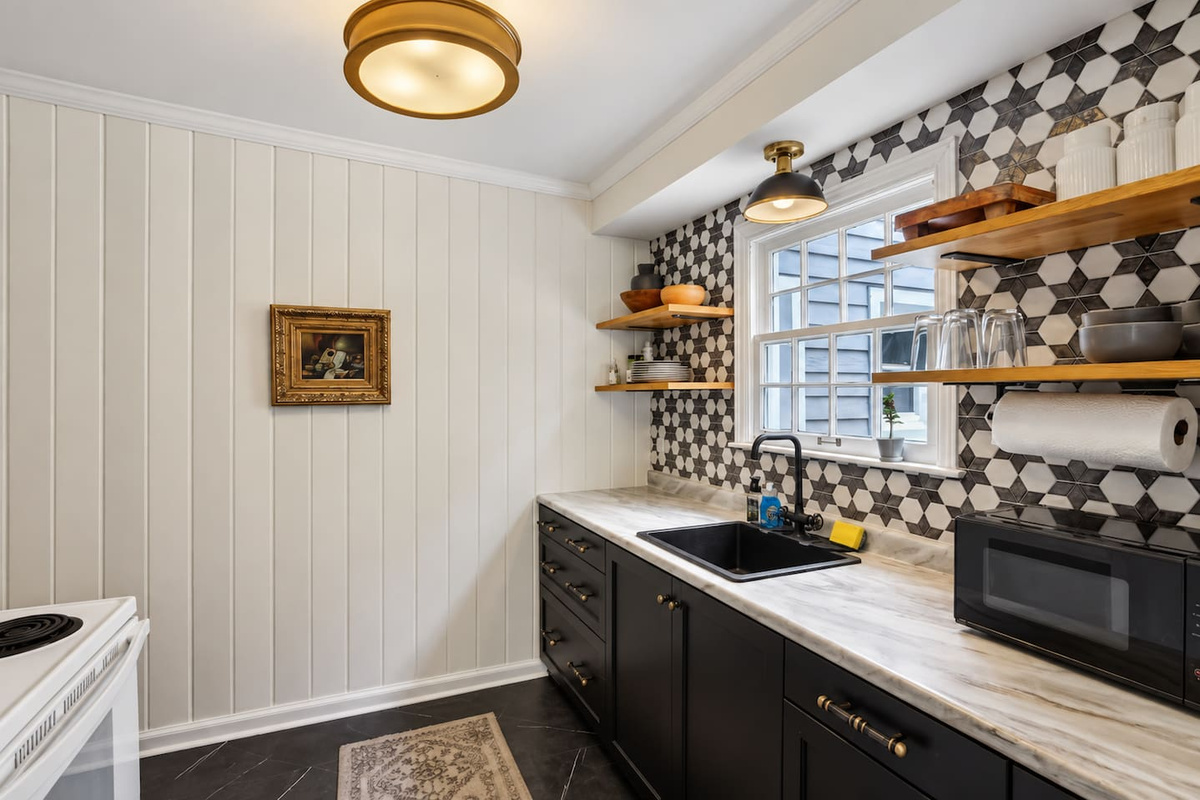 This efficient galley kitchen is fully stocked with everything you need to prepare a great meal.