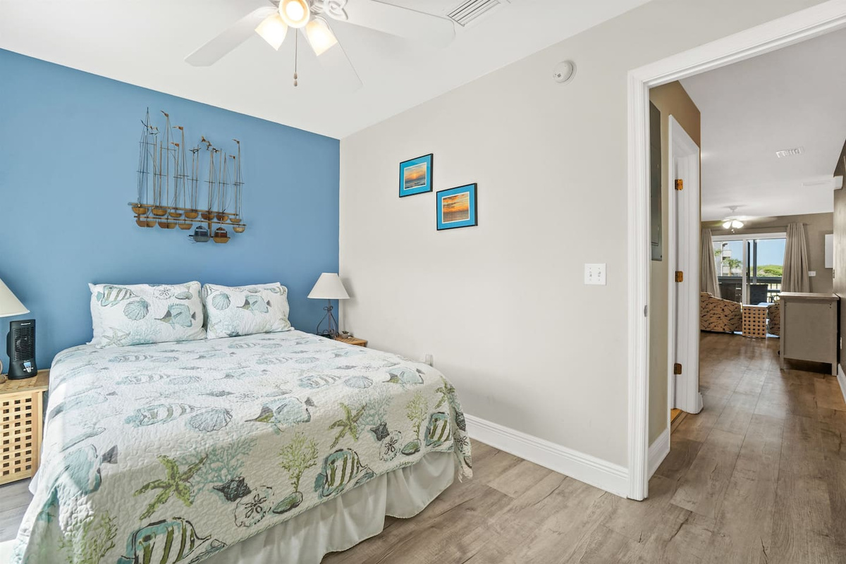 Sleep easy in the queen bedroom &mdash; main-level access, comfortable bed, your own quiet good night.
