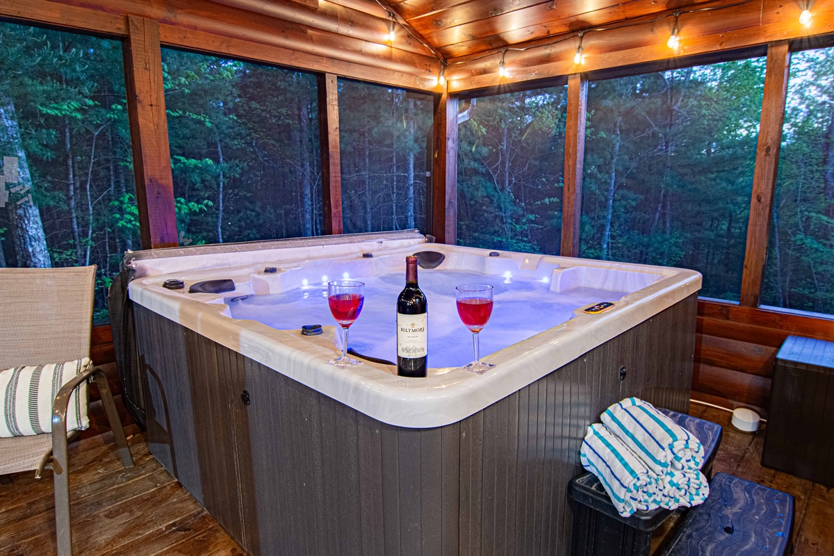 Enjoy the privacy of the wood surround and the protection of the screened in porch.