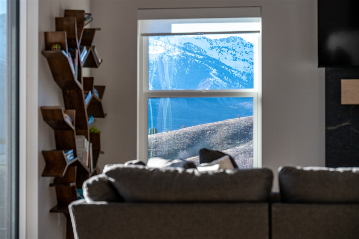 Built-in shelving and scenic views. Perfect place to relax and read a book.