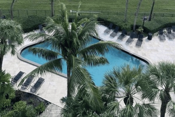 Ready to take a dip? Enjoy the community pool, located just behind the condo.