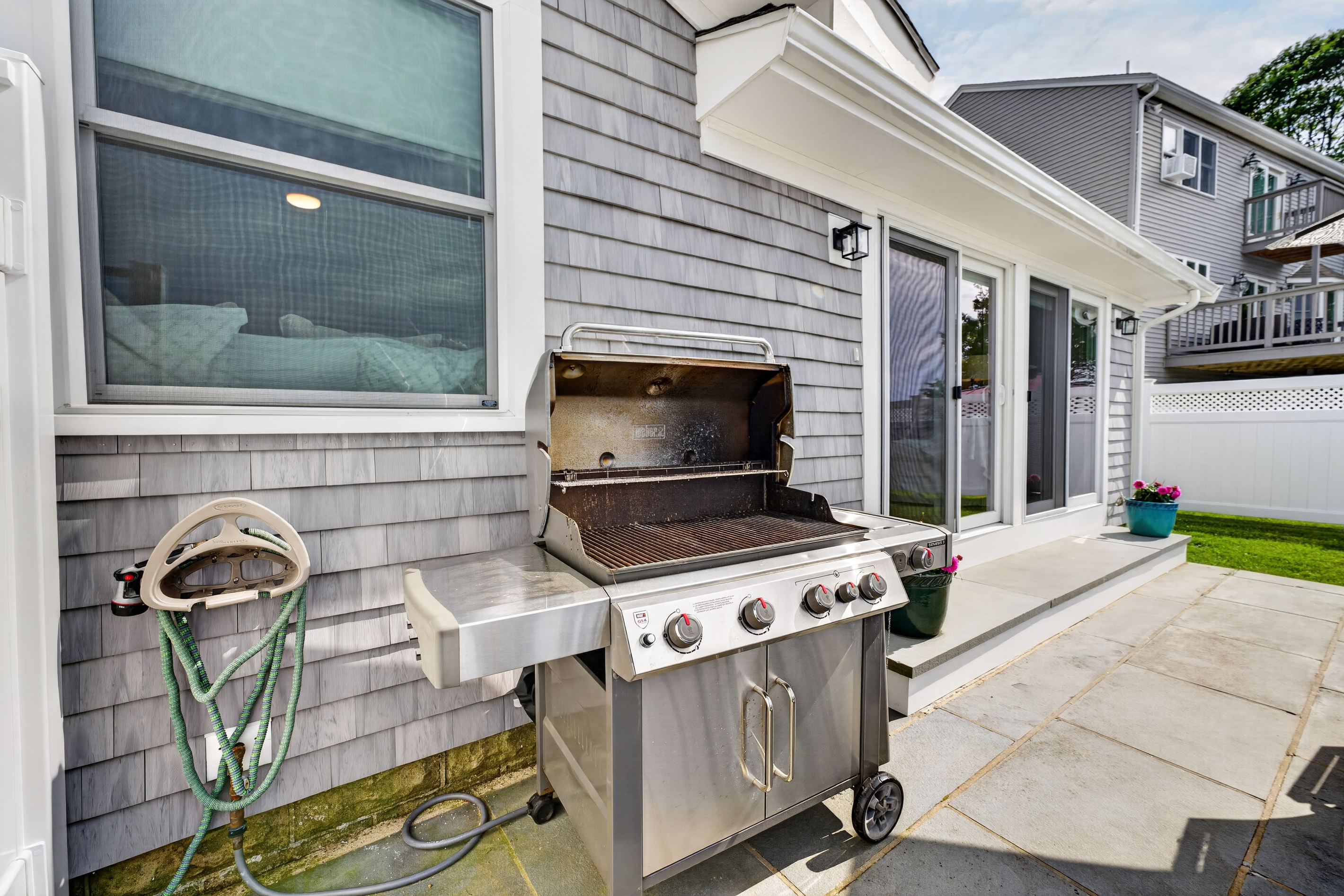 Fire up the grill and enjoy effortless outdoor cooking with the home's BBQ area.