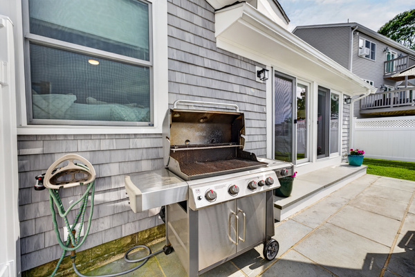 Fire up the grill and enjoy effortless outdoor cooking with the home's BBQ area.