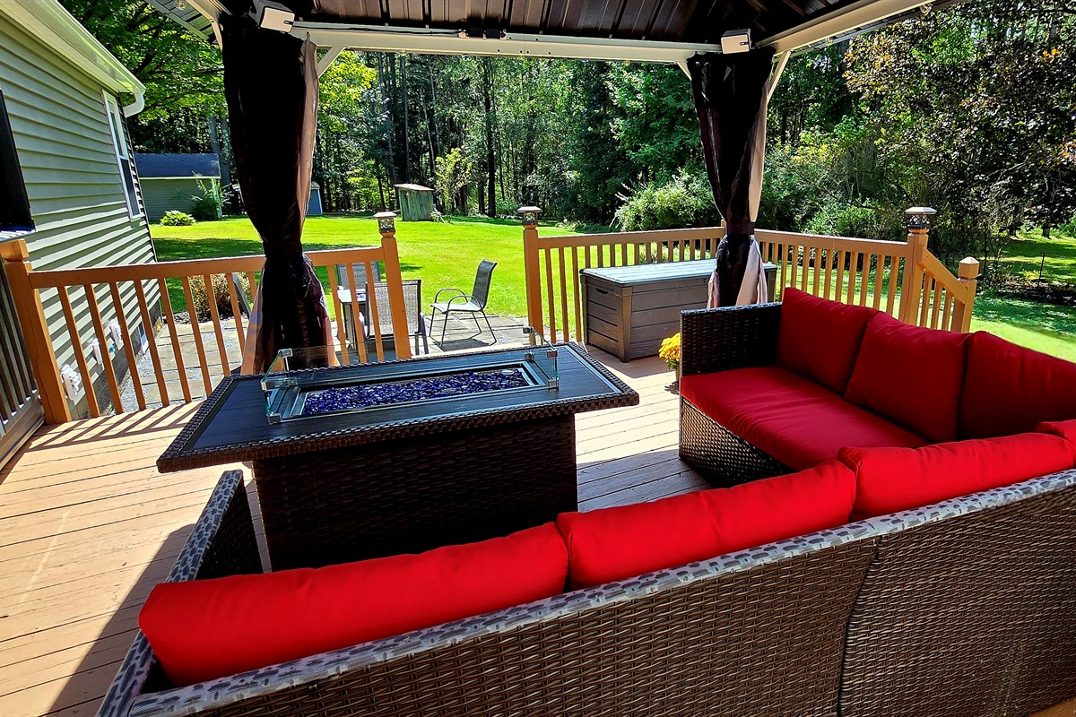 Rear deck with outside seating and dining
