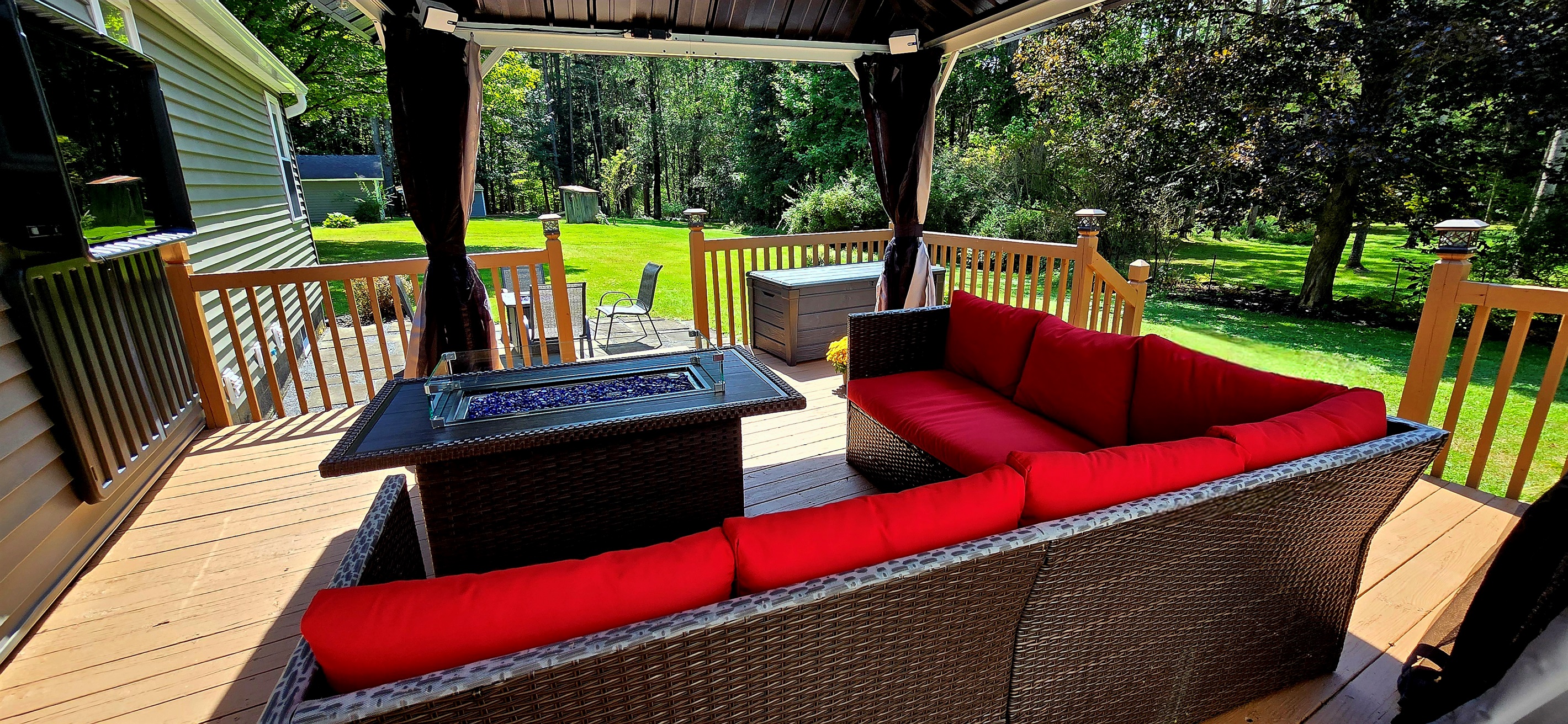 Rear deck with outside seating and dining