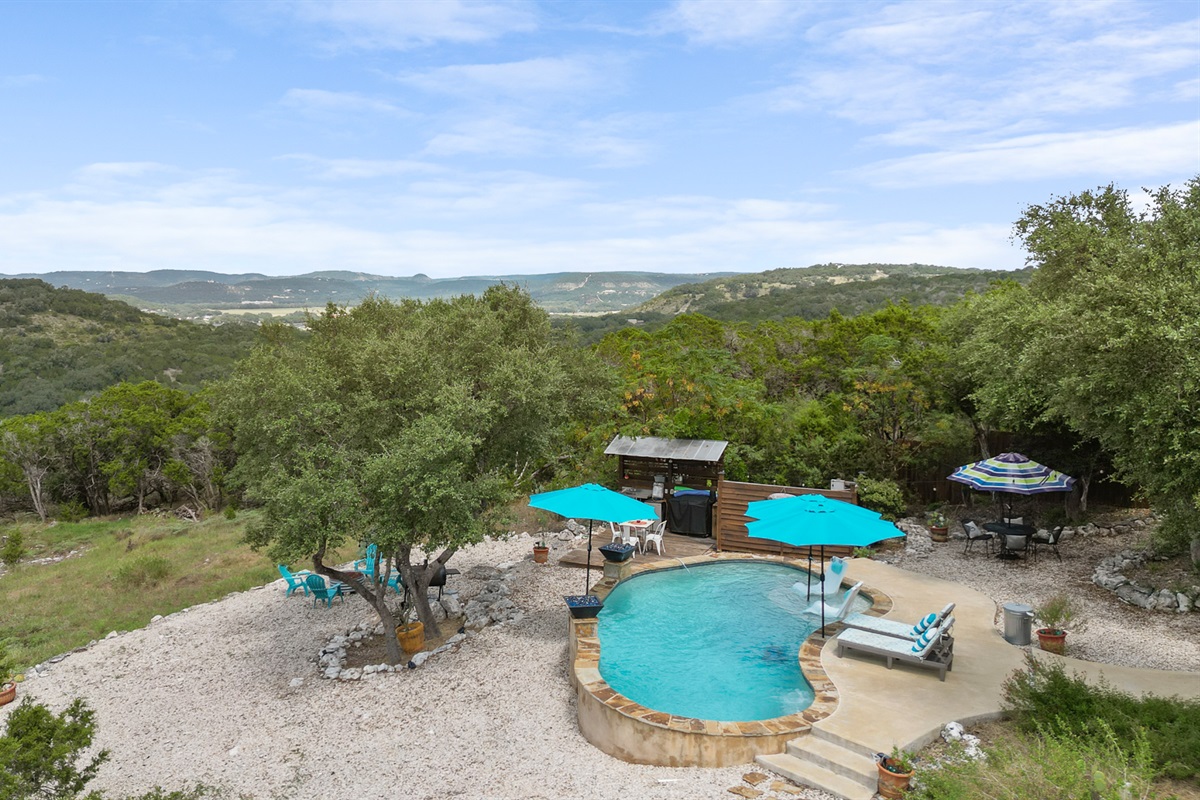 Golden hour over the pool and hills
