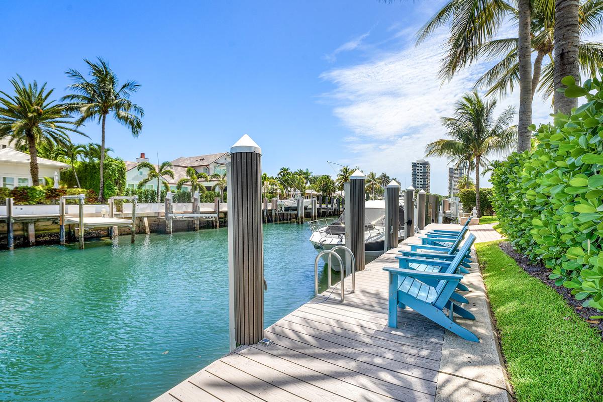 The boat shown is privately owned and not available for guest use. A separate portion of the dock is available for approved guest boats, subject to size restrictions and an additional fee.
