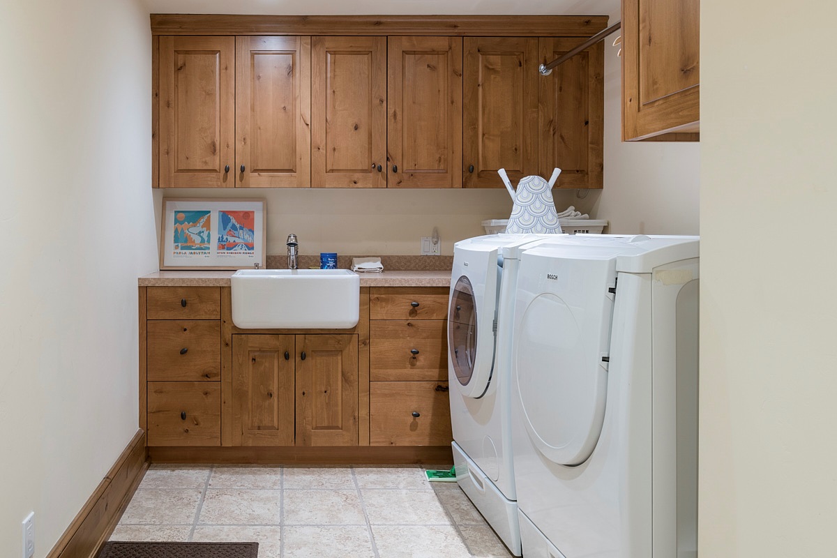 Laundry room with main washer and dryer on lower level