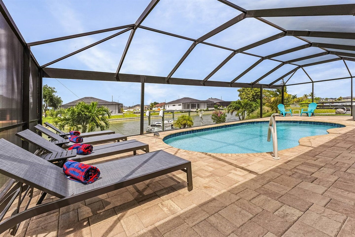 Relax and soak up the sun in the spacious lounging area with a refreshing spa!