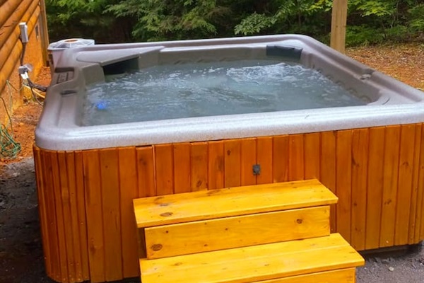 Very private backyard , open to acres and acres of wooded mountain preserve. Enjoy the hot tub surrounded by nothing but nature!