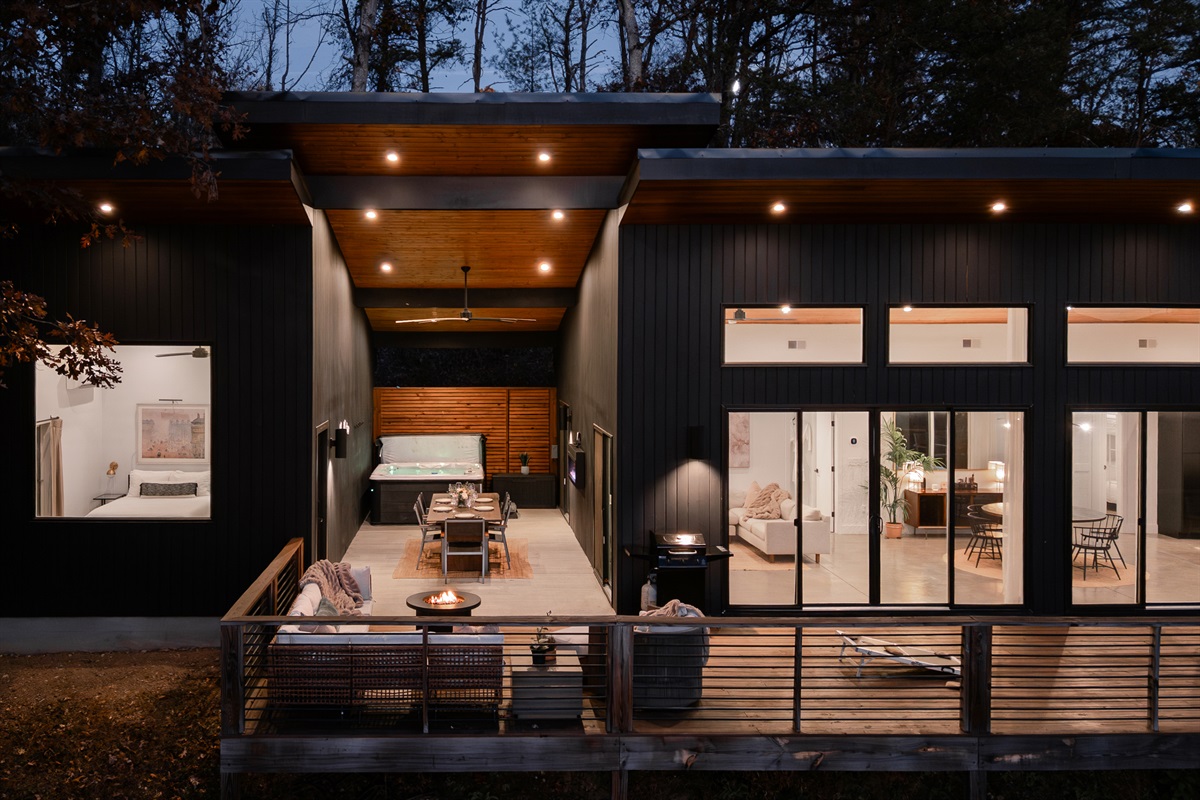 {Exterior - Glass House} Designed for connection—share meals, soak under the stars, and unwind as the forest surrounds you.