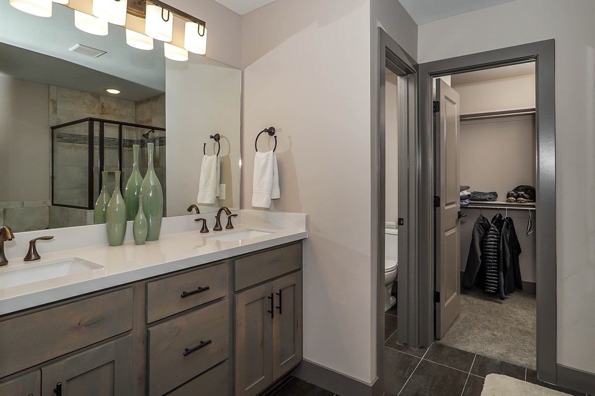Double vanity and walk-in closet in the primary ensuite.