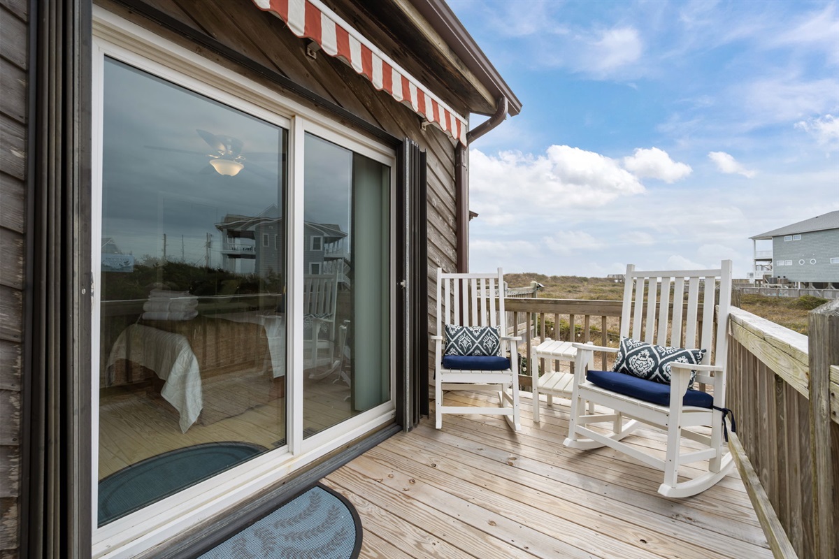 Private deck with rocking chairs&mdash;perfect for morning coffee or sunset unwinding
