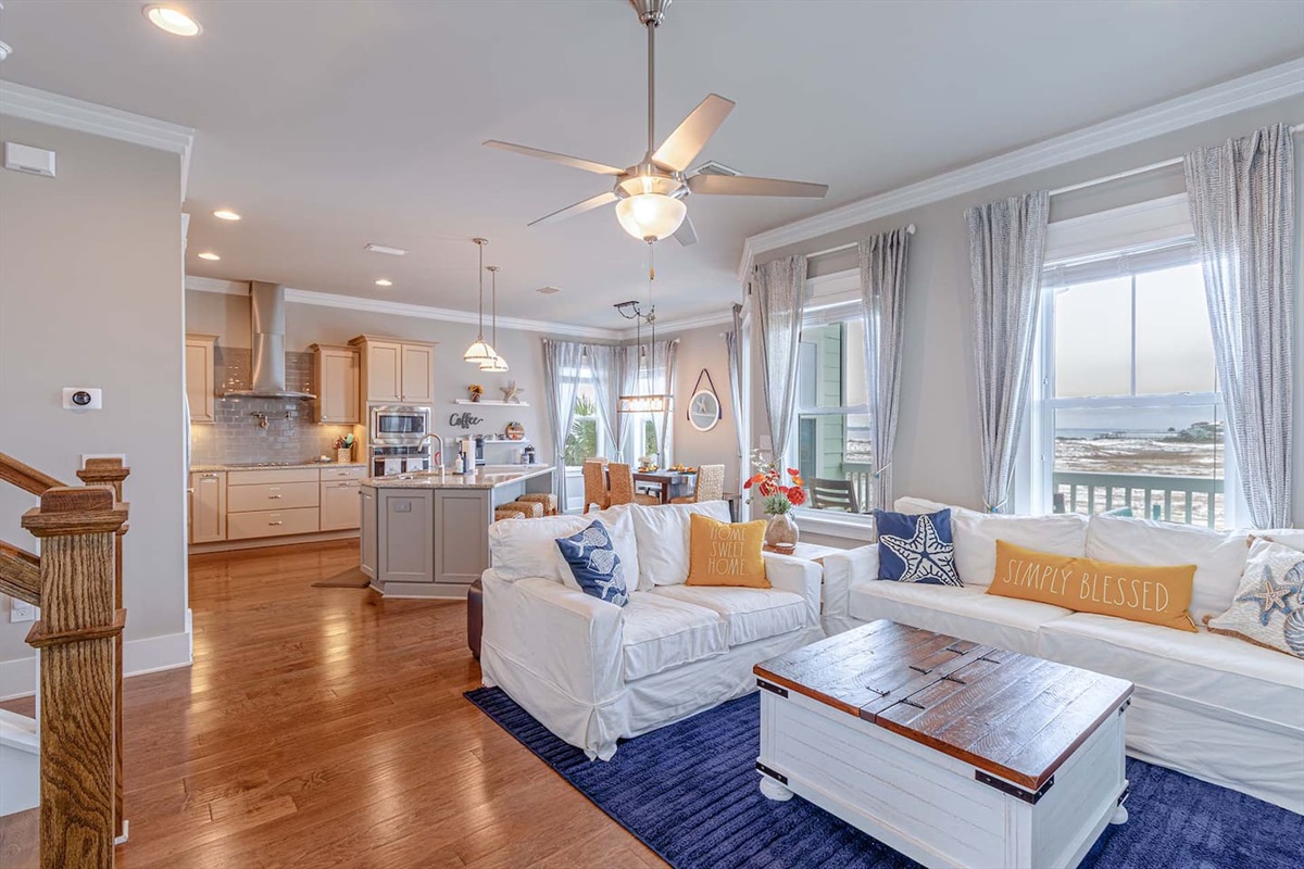 Living room with smart TV, books, and board games