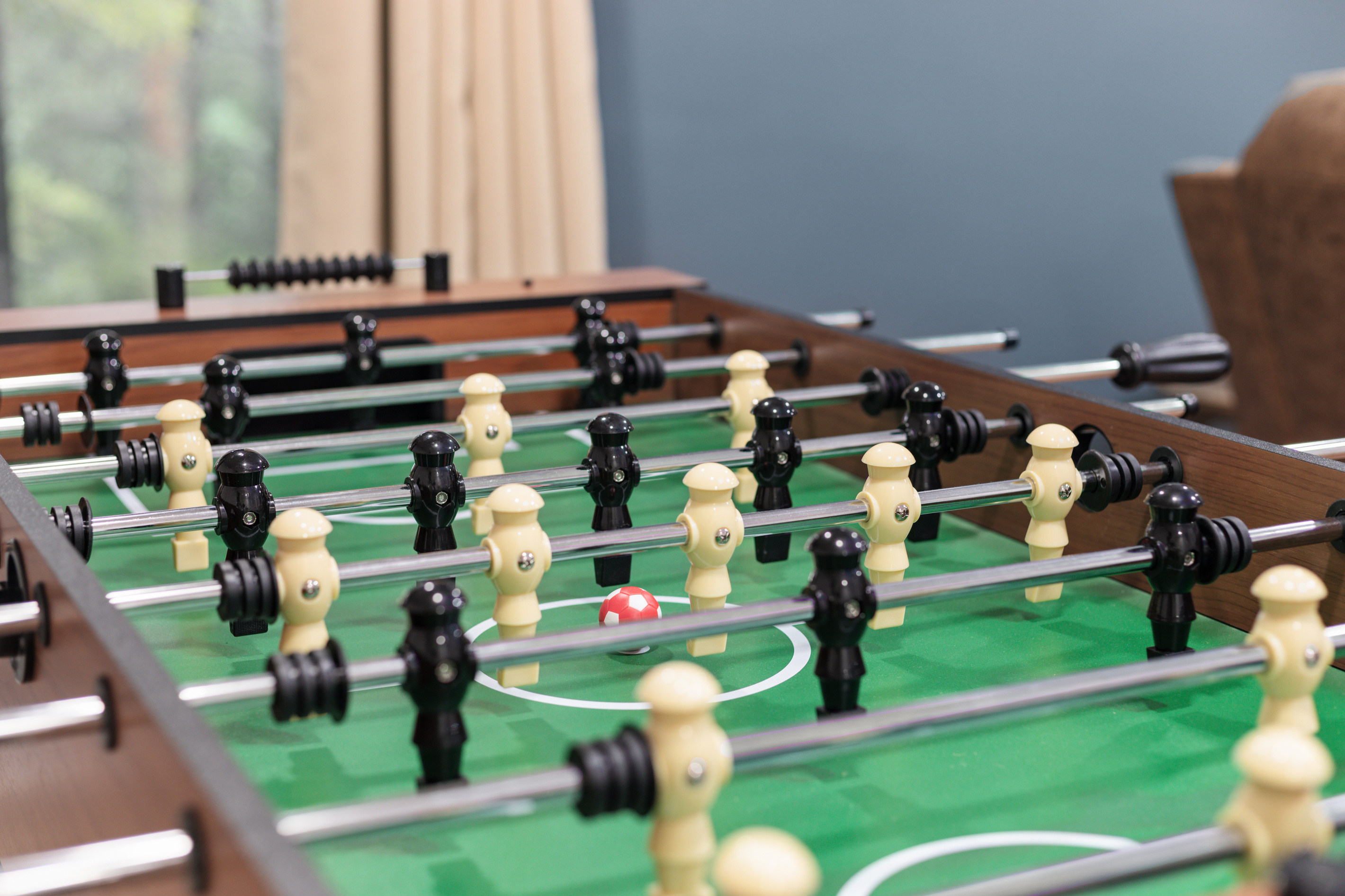 Challenge your crew to a match on the foosball table in our second den.