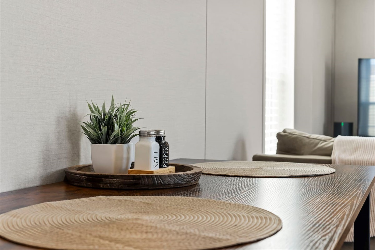 Simple and cozy dining setup with seating for meals, coffee, or work—perfect for a comfortable stay.