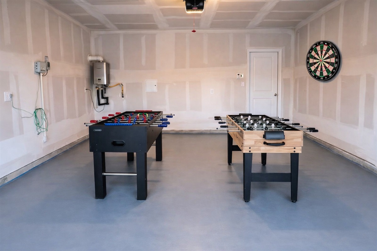 Garage game area with added dart board — fun entertainment for families and groups