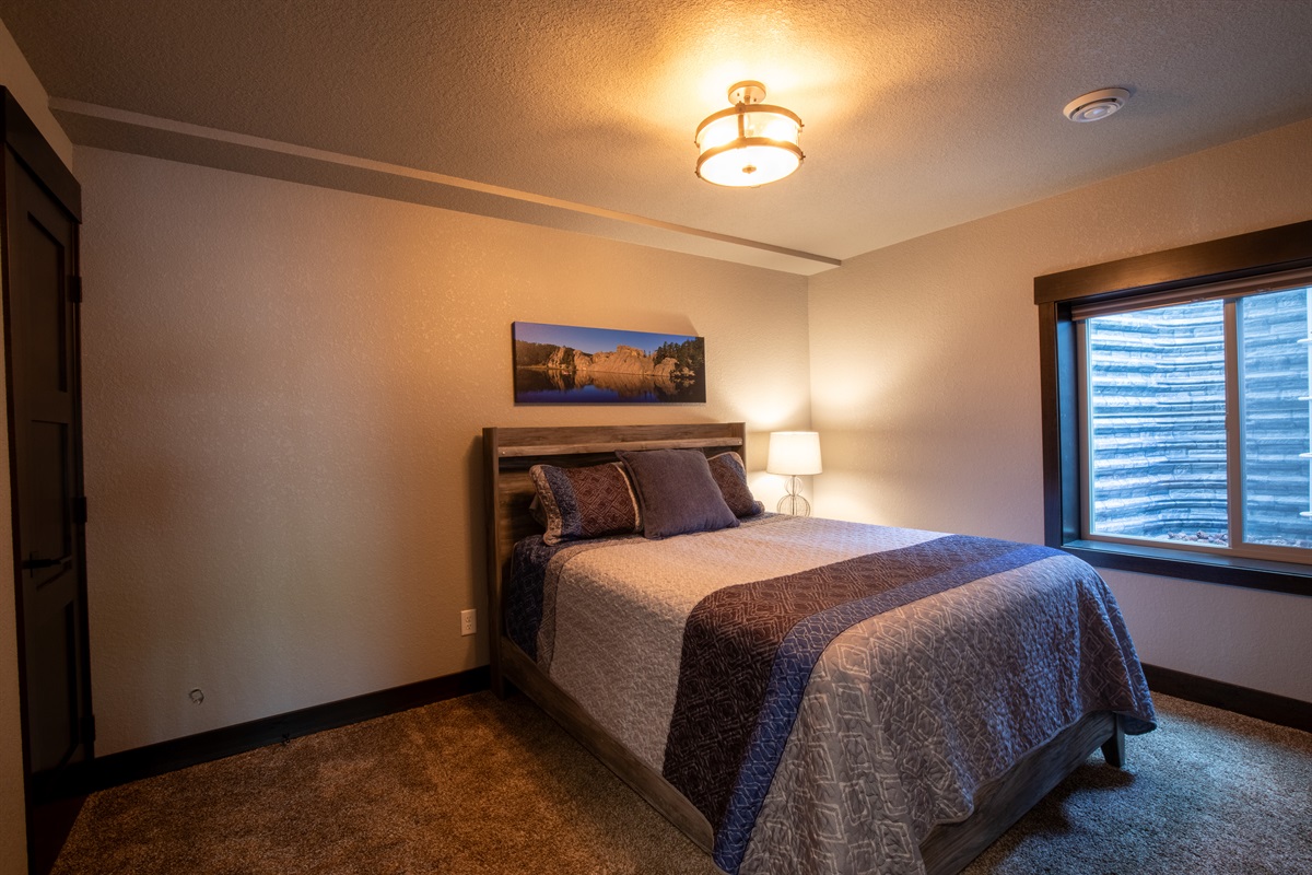 Plenty of room to spread out and make yourself at home in the lower level queen bedroom.