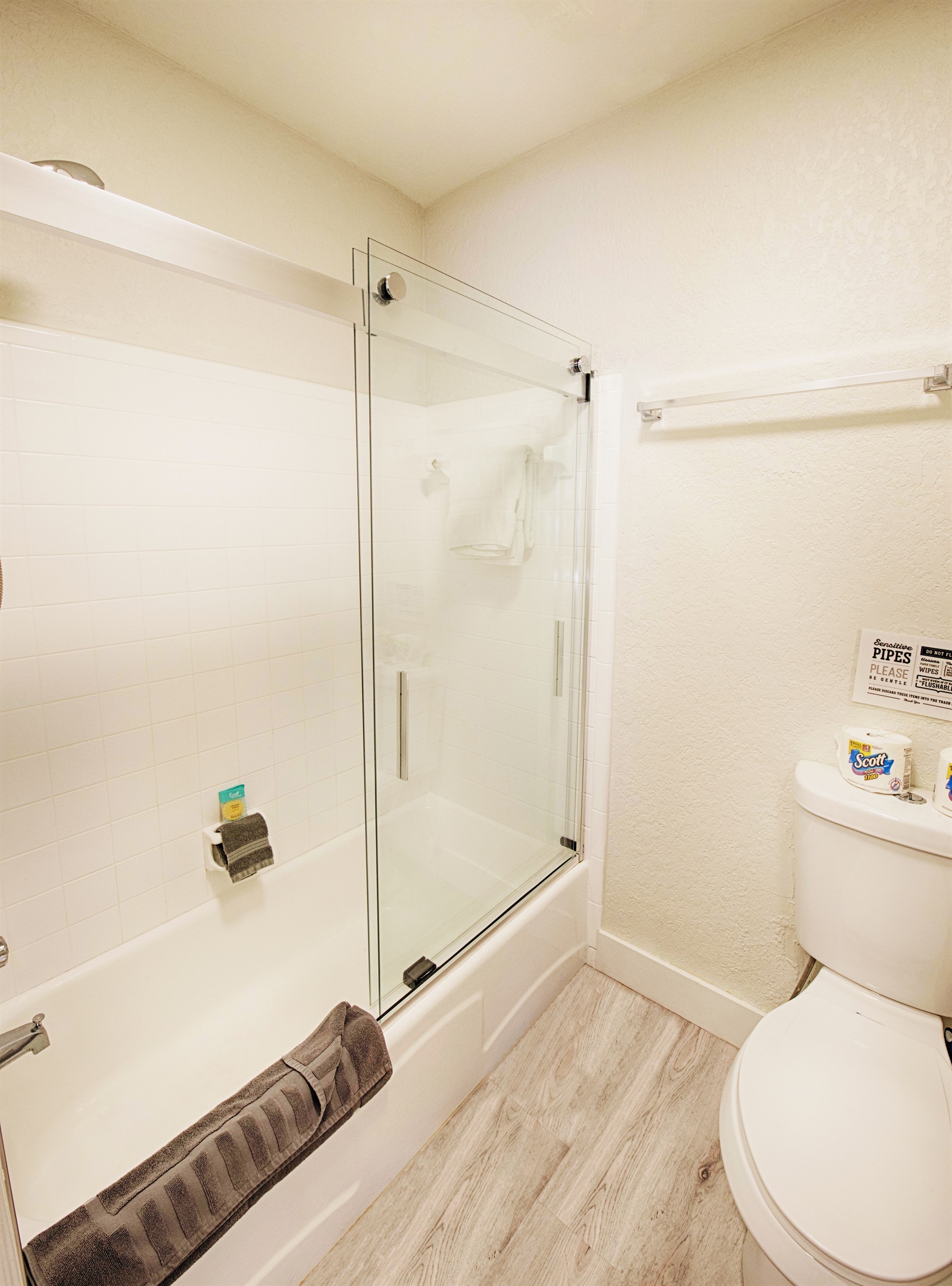 Bathroom with tub and shower combination.