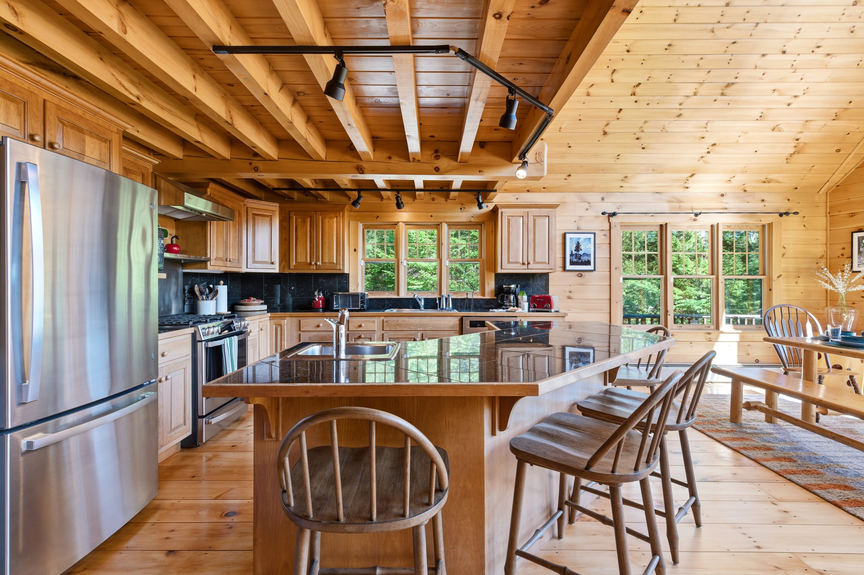 Enjoy cooking and gathering in a bright, open space with beautiful views throughout the home.