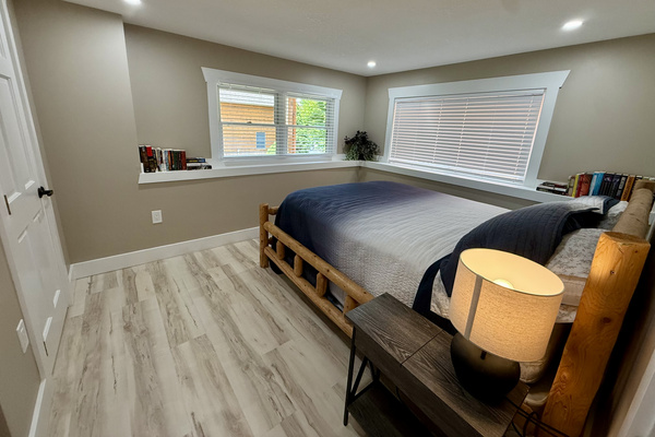 Bedroom downstairs in walkout basement with lake views