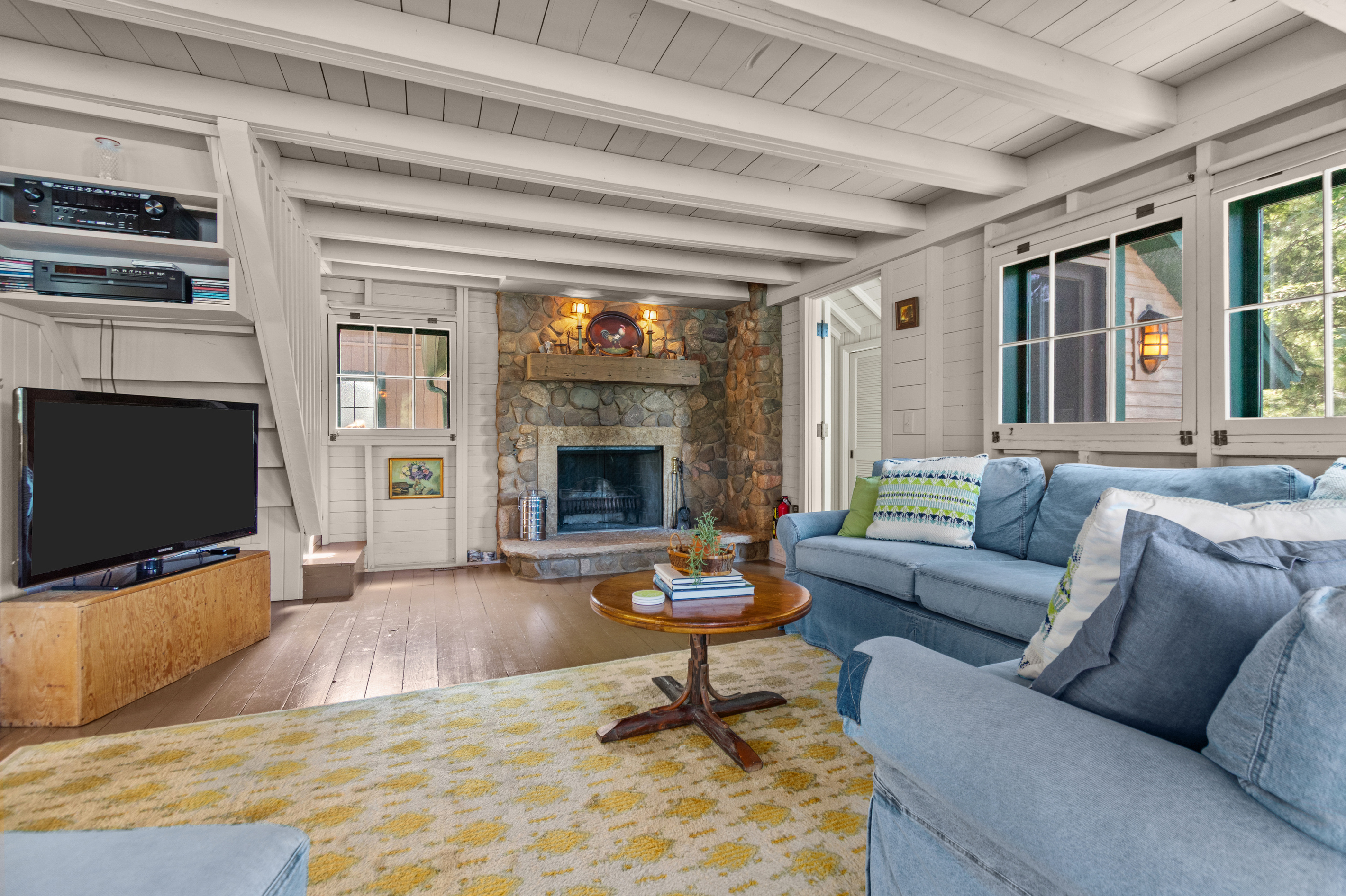 When the cooler seasons arrive, cozy up by the wood-burning fireplace and enjoy a warm, relaxing evening by the lake.