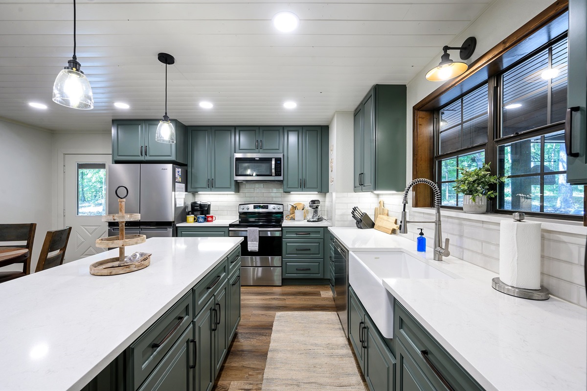 A chef's dream kitchen thats fully stocked with everything you would need to prepare a meal.