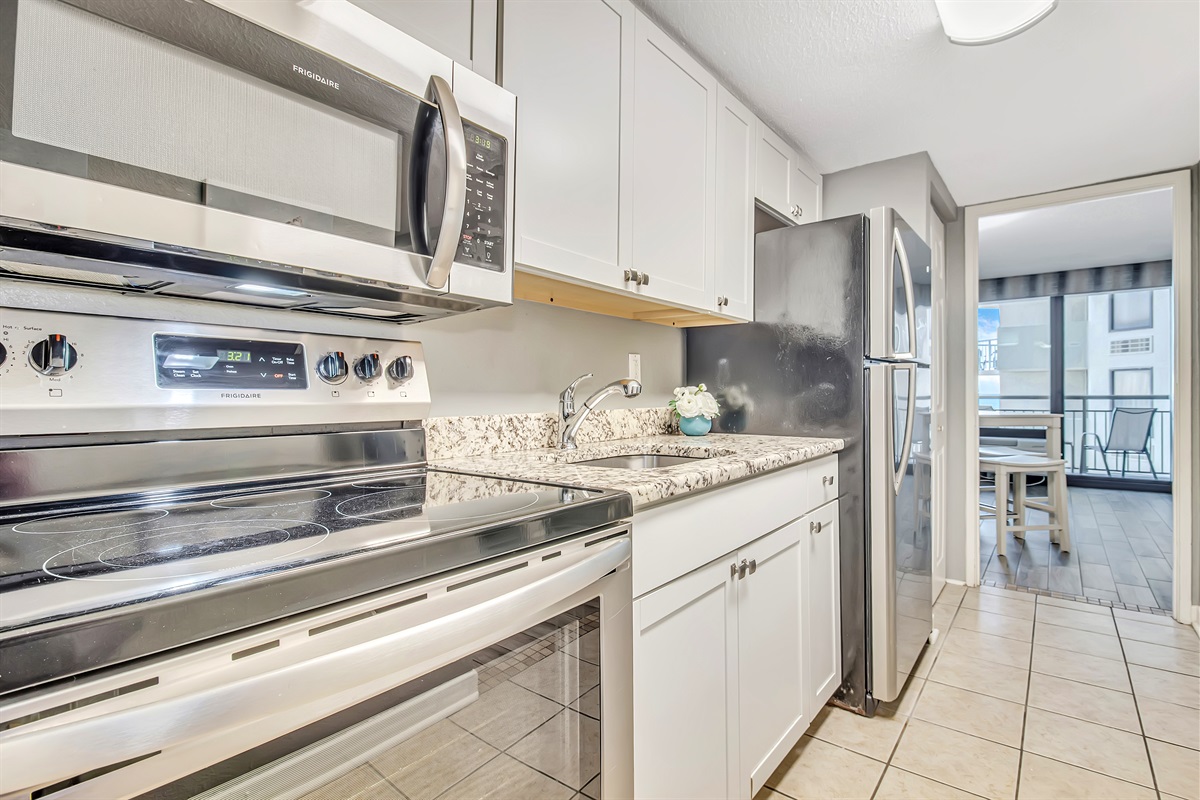 Immerse yourself in a contemporary coastal kitchen, featuring clean lines, sophisticated finishes, and a layout that maximizes both functionality and the scenic ocean view.