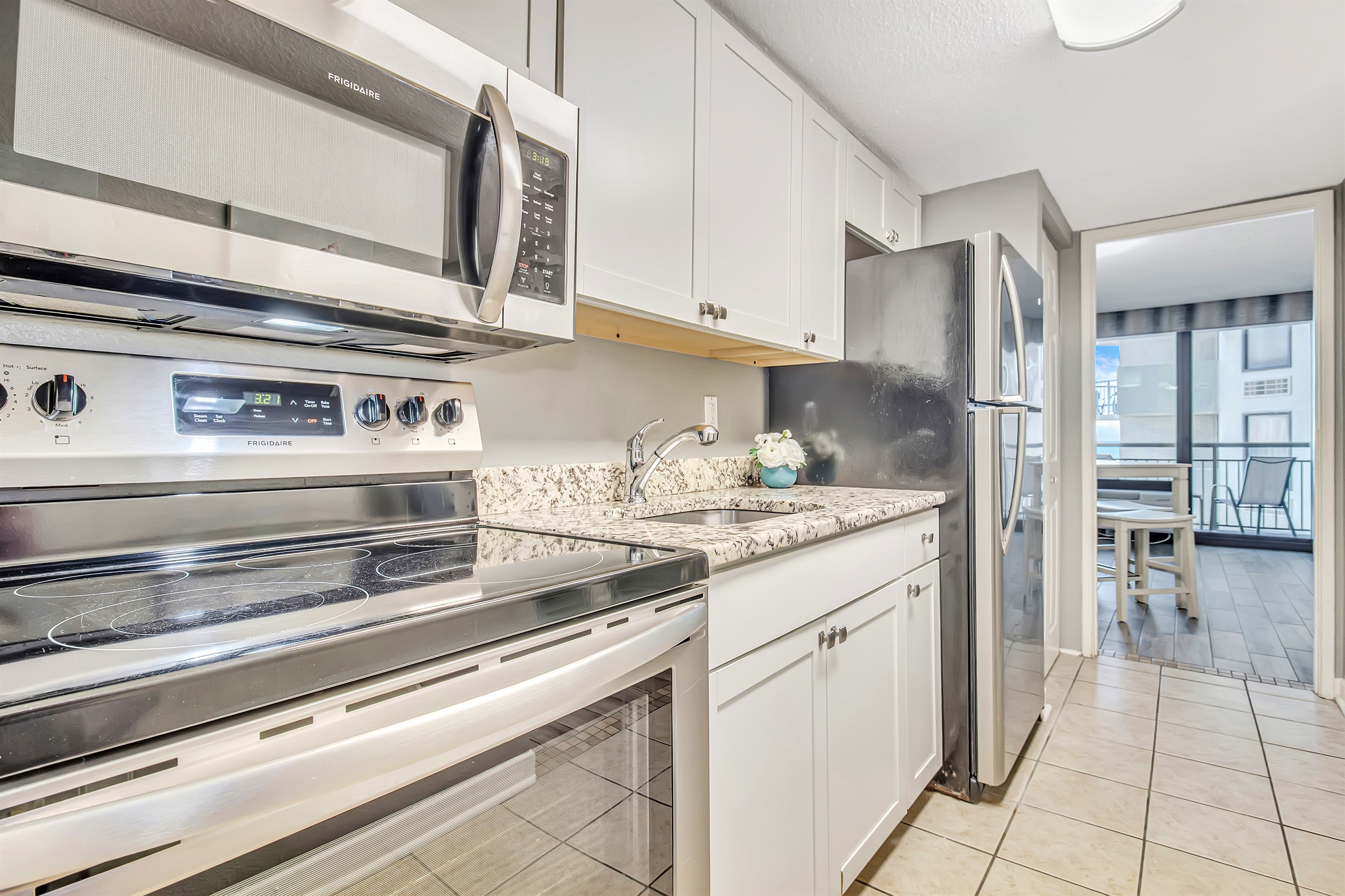 Immerse yourself in a contemporary coastal kitchen, featuring clean lines, sophisticated finishes, and a layout that maximizes both functionality and the scenic ocean view.