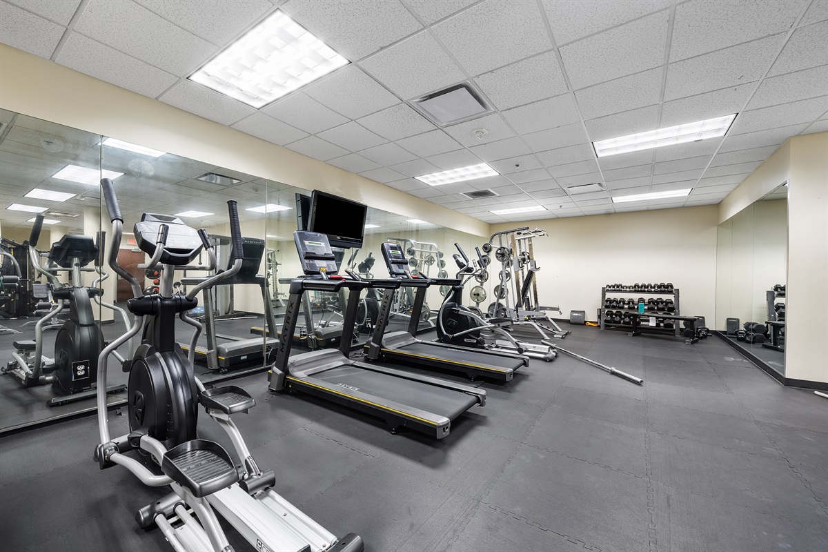 Treadmills, steppers, and rowers provided.