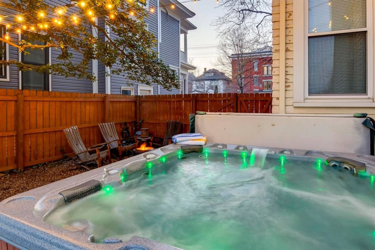 Outdoor patio and hot tub. Hot tub exclusively for the guests of this unit. 