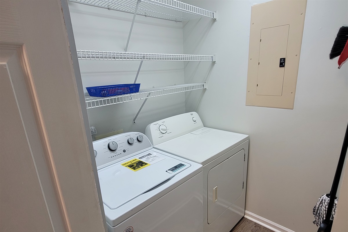 Full sized washer and dryer/laundry room
