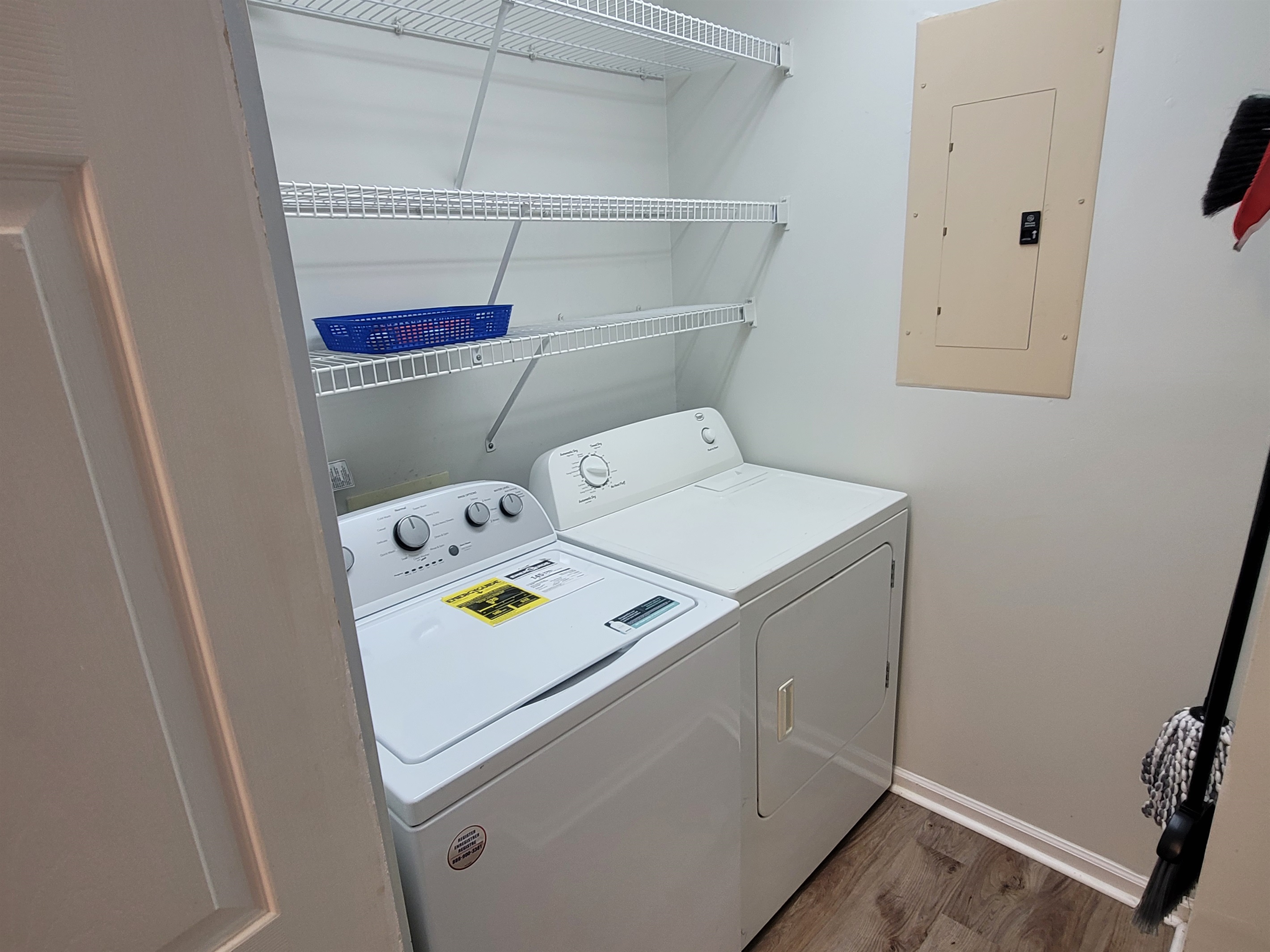 Full sized washer and dryer/laundry room