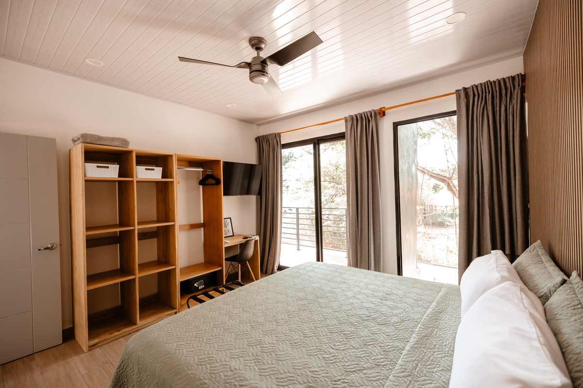 Full closet, smart TV, built-in workspace.