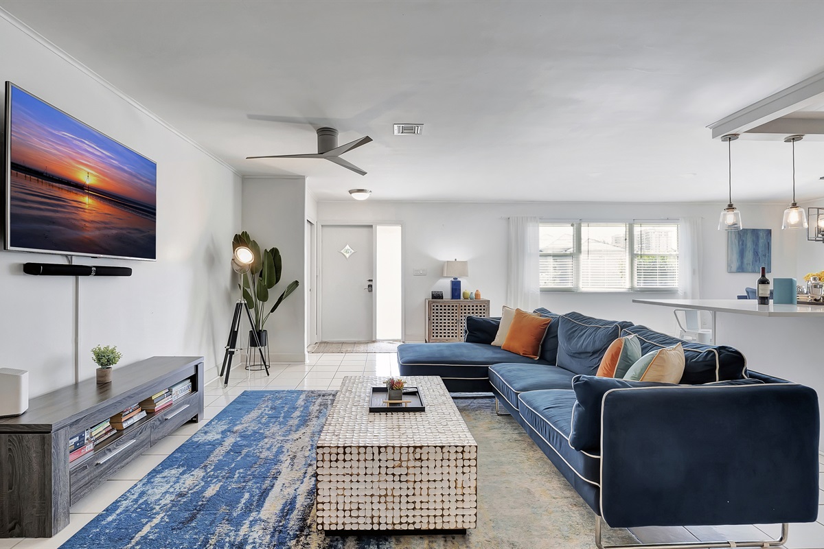 The living room with comfortable sofa and large Smart TV