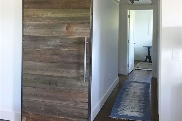 Gorgeous sliding door made from an old barn just down the road.  A special memento.