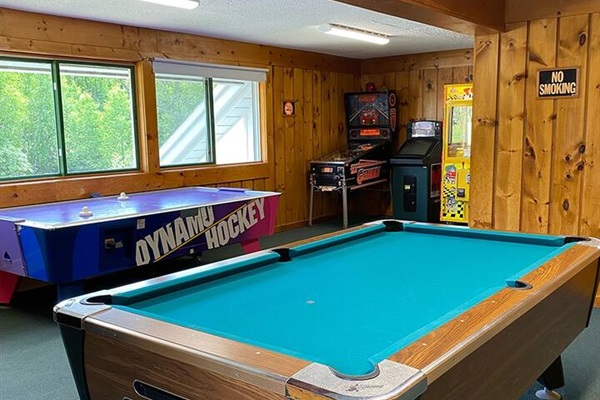 Game room - pool-table, ping-pong, air hockey and table games.