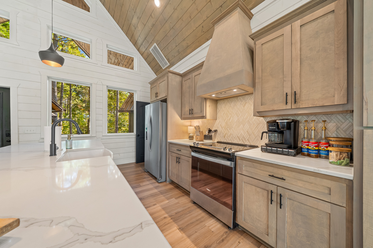 Plenty of prep space and an open layout mean the cook never misses the fun.