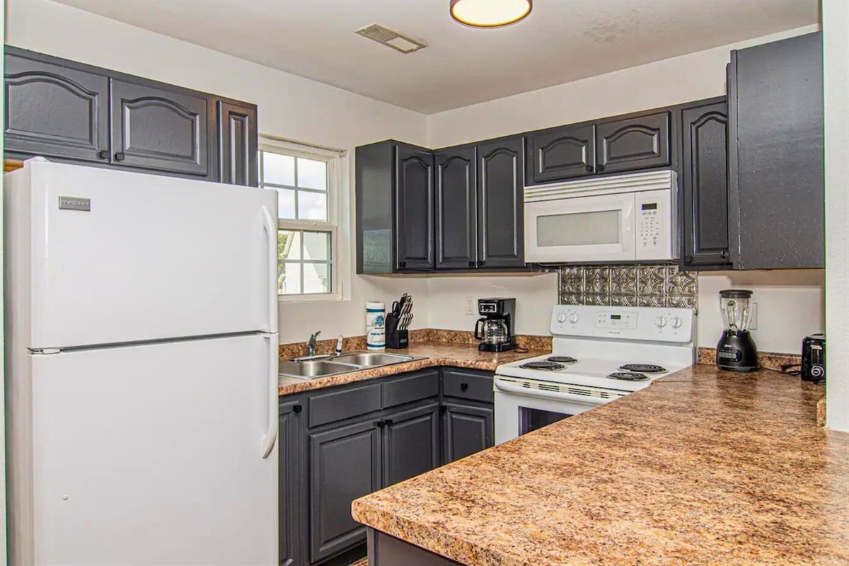 Craft your favorite dishes in our kitchen, complete with modern appliances and plenty of counter space for your culinary adventures.