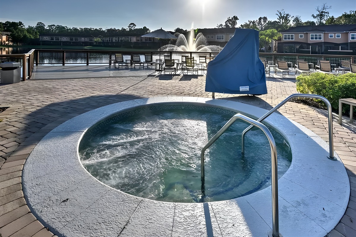 There is a warm jacuzzi in the pool area